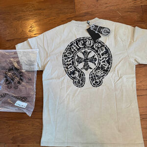 chrome-branded style with heart designs Washed Graphic Tee – Size large